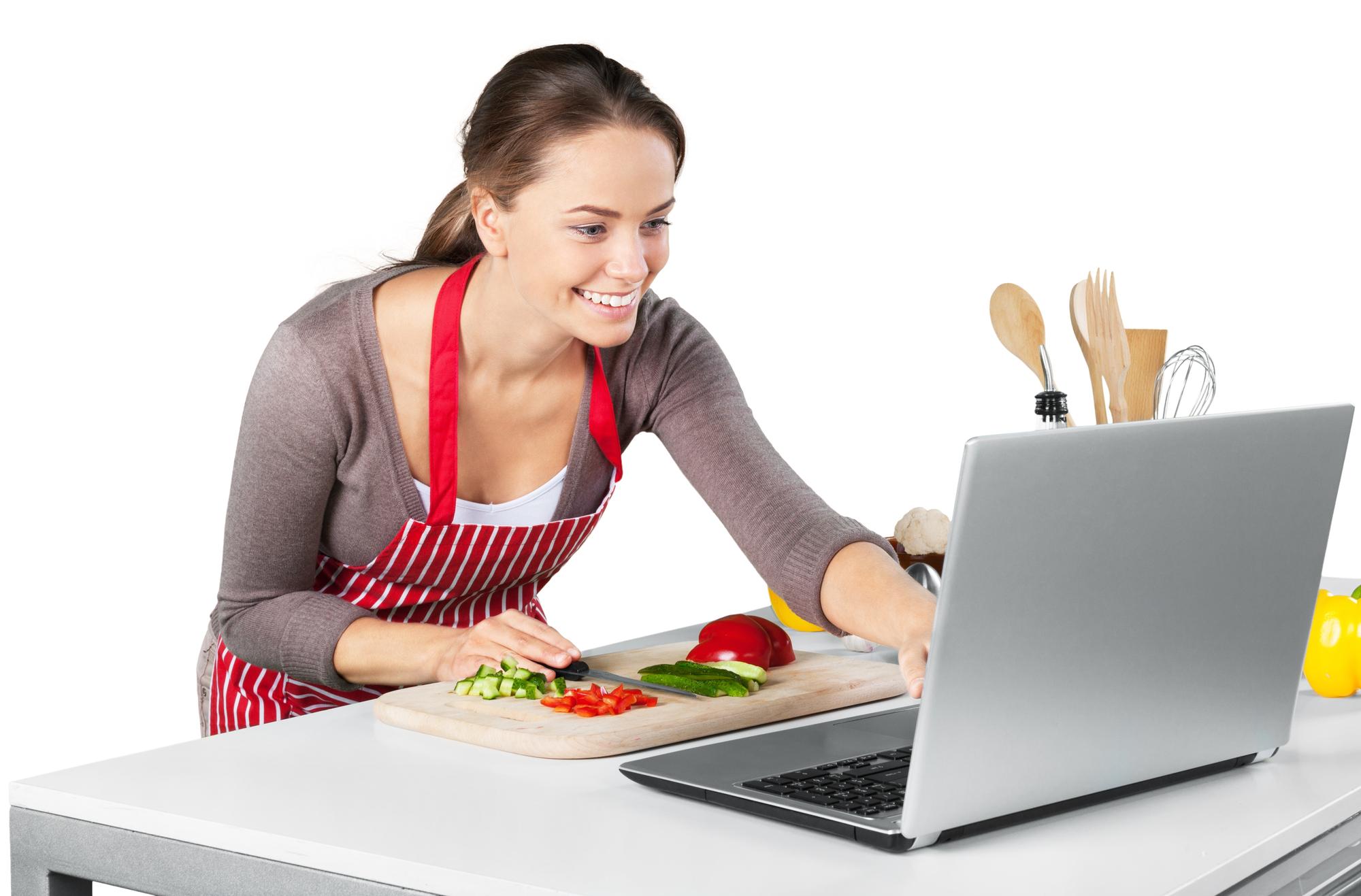 Student cooking in a bright kitchen