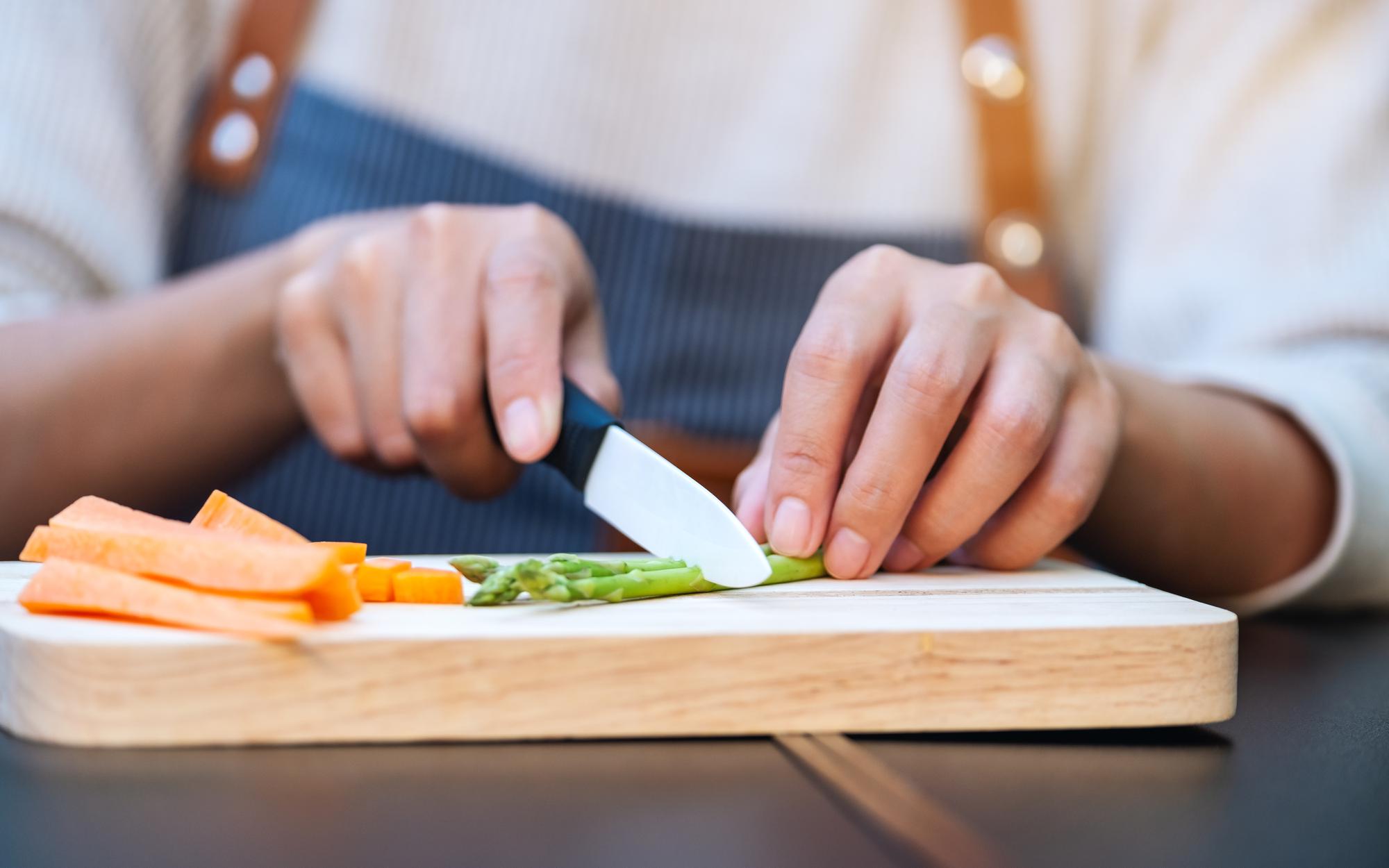 Detail of knife skills on cutting board