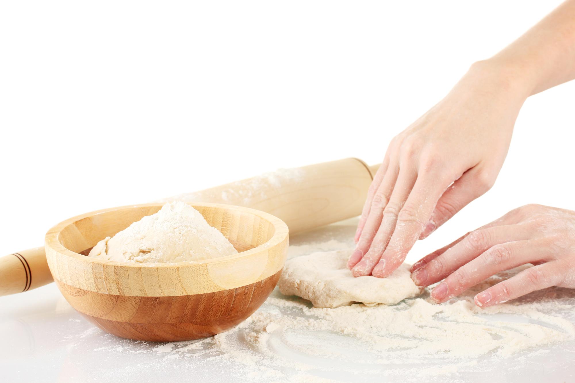 Baking hands shaping dough